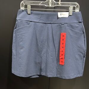 GU Golf Skort Slit front,pockets,deep back zip pocket,mesh boxer lined,stretch